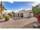 Spacious backyard with a covered patio, perfect for outdoor entertaining and relaxation in a private setting at 6118 E Star Valley St, Mesa, AZ 85215