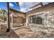 Inviting home entrance with brick accents, desert landscaping, and a tile roof at 6118 E Star Valley St, Mesa, AZ 85215