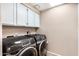 Functional laundry room equipped with modern Samsung washer and dryer units at 6118 E Star Valley St, Mesa, AZ 85215