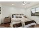 Relaxing bedroom with neutral colors, hardwood floors, and serene natural lighting at 619 E Jensen St # 80, Mesa, AZ 85203