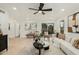 Inviting living room featuring an open layout, contemporary furnishings, and seamless access to the outdoors at 619 E Jensen St # 80, Mesa, AZ 85203