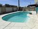 A refreshing outdoor swimming pool surrounded by a paved patio, perfect for relaxation and entertaining guests at 6437 W Devonshire Ave, Phoenix, AZ 85033