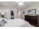 Bedroom featuring neutral colors, dresser and closet space, for restful nights at 6634 S Pinnacle Ct, Chandler, AZ 85249