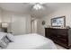 Bedroom featuring neutral colors, dresser and closet space, for restful nights at 6634 S Pinnacle Ct, Chandler, AZ 85249