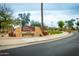 Community entrance sign in a well maintained and landscaped setting at 6634 S Pinnacle Ct, Chandler, AZ 85249