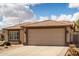 Charming single-story home featuring a spacious two car garage and desert landscaping at 6634 S Pinnacle Ct, Chandler, AZ 85249