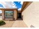 Inviting front entrance featuring a brick walkway and a well-maintained exterior at 6634 S Pinnacle Ct, Chandler, AZ 85249