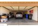 Spacious garage with ample storage space for vehicles and other items at 6634 S Pinnacle Ct, Chandler, AZ 85249