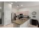 Modern kitchen featuring stainless steel appliances and ample counter space at 6634 S Pinnacle Ct, Chandler, AZ 85249