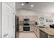 Well-appointed kitchen featuring stainless steel appliances and granite countertops at 6634 S Pinnacle Ct, Chandler, AZ 85249