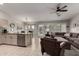 Open-concept living space with seamless flow from the kitchen to the living room, perfect for entertaining at 6634 S Pinnacle Ct, Chandler, AZ 85249