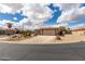 Corner lot home with a manicured yard and desert landscaping in a quiet neighborhood at 6634 S Pinnacle Ct, Chandler, AZ 85249