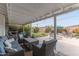 Enjoy this shaded back patio, complete with plush seating, and an outdoor barbecue at 6702 E Monte Vista Rd, Scottsdale, AZ 85257