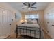 Inviting bedroom with a soft color palette, ceiling fan, and plantation shutters for a serene feel at 6702 E Monte Vista Rd, Scottsdale, AZ 85257