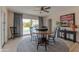 Dining area with views of a sparkling pool and outdoor space, with access through sliding glass doors at 6702 E Monte Vista Rd, Scottsdale, AZ 85257