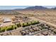 Aerial view showcasing community, desert landscape, and mountain backdrop at 6915 S Sapphire Way, Chandler, AZ 85249