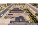 Aerial shot of two homes with solar panels and an inviting backyard at 6915 S Sapphire Way, Chandler, AZ 85249