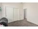 Bedroom featuring carpeted floors and closet at 6915 S Sapphire Way, Chandler, AZ 85249