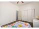 Bedroom featuring closet, ceiling fan and carpeted floors at 6915 S Sapphire Way, Chandler, AZ 85249