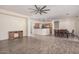 Open-concept living space blending seamlessly with a kitchen and dining area at 6915 S Sapphire Way, Chandler, AZ 85249