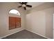 Inviting bedroom with neutral carpet, light walls, and a window with wood blinds at 819 W Harbor Dr, Gilbert, AZ 85233