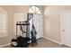 Inviting foyer with wood-look tile flooring and ample natural light, creating a warm welcome at 819 W Harbor Dr, Gilbert, AZ 85233