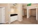 Neutral-toned hallway with a wet bar and an arched alcove creates an open, flowing space at 819 W Harbor Dr, Gilbert, AZ 85233