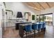 Modern kitchen with a large island, sleek countertops, and counter seating, perfect for entertaining guests at 9114 N 55Th St, Paradise Valley, AZ 85253