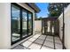 Enclosed outdoor shower and private sauna area adjacent to the modern bathroom at 9114 N 55Th St, Paradise Valley, AZ 85253