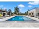 Large rectangular pool with patio and manicured landscaping; ideal for relaxation and outdoor activities at 9114 N 55Th St, Paradise Valley, AZ 85253