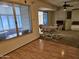 Breakfast nook featuring tile floor and an adjacent carpeted room at 9847 W Silver Bell Dr, Sun City, AZ 85351