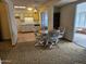 Kitchen and breakfast nook featuring ample cabinet storage at 9847 W Silver Bell Dr, Sun City, AZ 85351