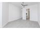 This light-filled bedroom has light gray flooring and leads into an adjacent bathroom at 9850 E Mcdowell Mountain Ranch Rd # 1006, Scottsdale, AZ 85260