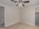 Bedroom featuring wood-look floors and an open closet at 10135 W Orange Dr, Glendale, AZ 85307