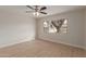 Spacious bedroom featuring wood-look floors and a large window providing plenty of natural light at 10135 W Orange Dr, Glendale, AZ 85307