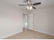 Bedroom featuring wood-look floors and a ceiling fan at 10135 W Orange Dr, Glendale, AZ 85307