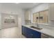 Bright kitchen with stainless appliances, white backsplash, and ample counter space at 10135 W Orange Dr, Glendale, AZ 85307