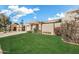 Inviting home with desert landscaping, decorative concrete, and an attached two car garage at 10538 E Gold Dust Cir, Scottsdale, AZ 85258