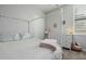Charming bedroom featuring soft decor, a canopy bed, and ample natural light at 1265 E La Fortuna Ct, San Tan Valley, AZ 85140