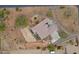 A bird's eye view of a home's well-maintained backyard with stone pathways and desert landscaping at 130 E Jordon Ln, Phoenix, AZ 85086