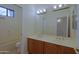 Well-maintained bathroom featuring a double vanity and shower/tub combo at 130 E Jordon Ln, Phoenix, AZ 85086
