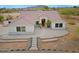 Charming single-story home featuring a tile roof, stucco exterior, and beautifully landscaped front yard at 130 E Jordon Ln, Phoenix, AZ 85086