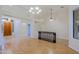 Spacious open-concept living room with hardwood floors and natural light at 130 E Jordon Ln, Phoenix, AZ 85086