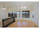 Bright open living area with hardwood floors, lots of windows and staircase at 130 E Jordon Ln, Phoenix, AZ 85086