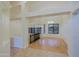 Bright living room with hardwood floors, view of the dining room, and an open layout at 130 E Jordon Ln, Phoenix, AZ 85086