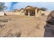 Expansive backyard featuring a covered patio and block wall, perfect for outdoor activities and entertaining at 13202 N 126Th Ave, El Mirage, AZ 85335