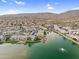 Aerial community view of lakeside condos in a Primary planned community with mountain views in the distance at 16013 S Desert Foothills Pkwy # 2089, Phoenix, AZ 85048
