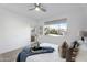 Comfortable bedroom featuring a queen-size bed and a large window view at 16013 S Desert Foothills Pkwy # 2089, Phoenix, AZ 85048