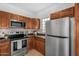 Modern kitchen appliances and granite countertops offer a touch of elegance at 16013 S Desert Foothills Pkwy # 2089, Phoenix, AZ 85048