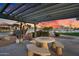 Outdoor patio area with a grill and dining space, perfect for entertaining by the lake at 16013 S Desert Foothills Pkwy # 2089, Phoenix, AZ 85048